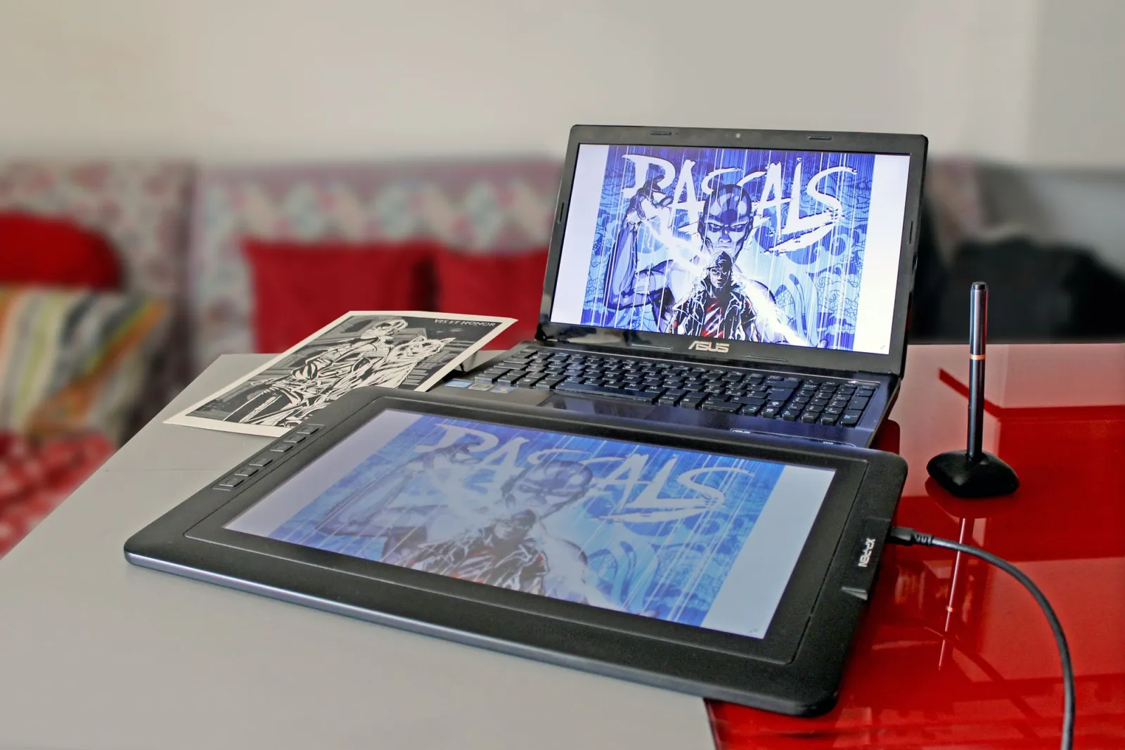 Digital drawing tablet paired with a laptop for design and outpainting work