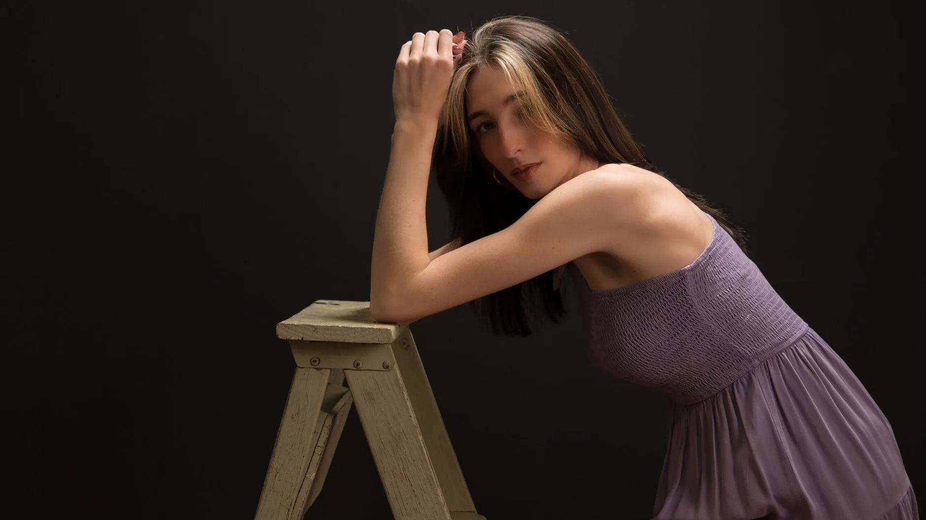 Lifestyle studio portrait of a model, the controlled look AI influencer characters are trained to reproduce across every post