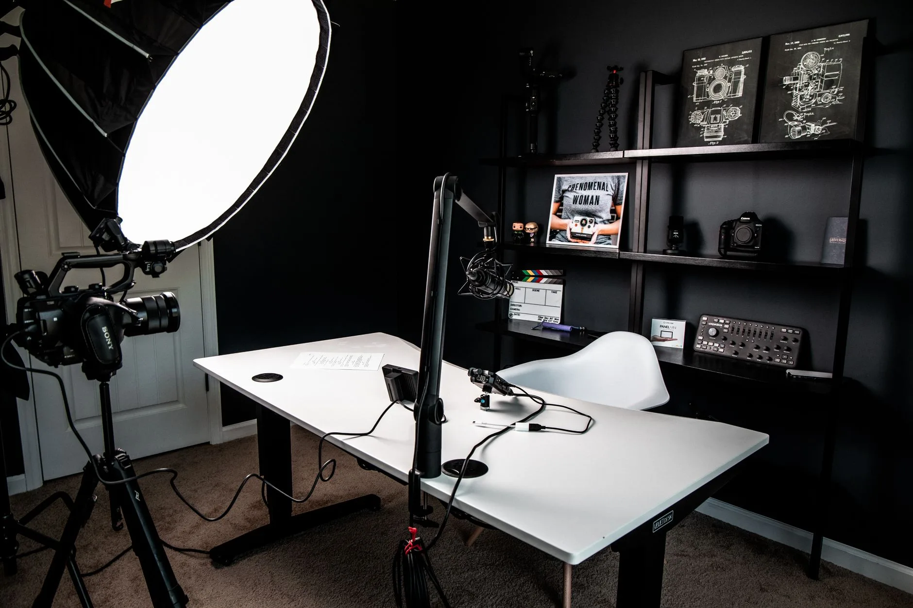 Vlogging studio with ring light and camera, the physical production an AI influencer pipeline sidesteps