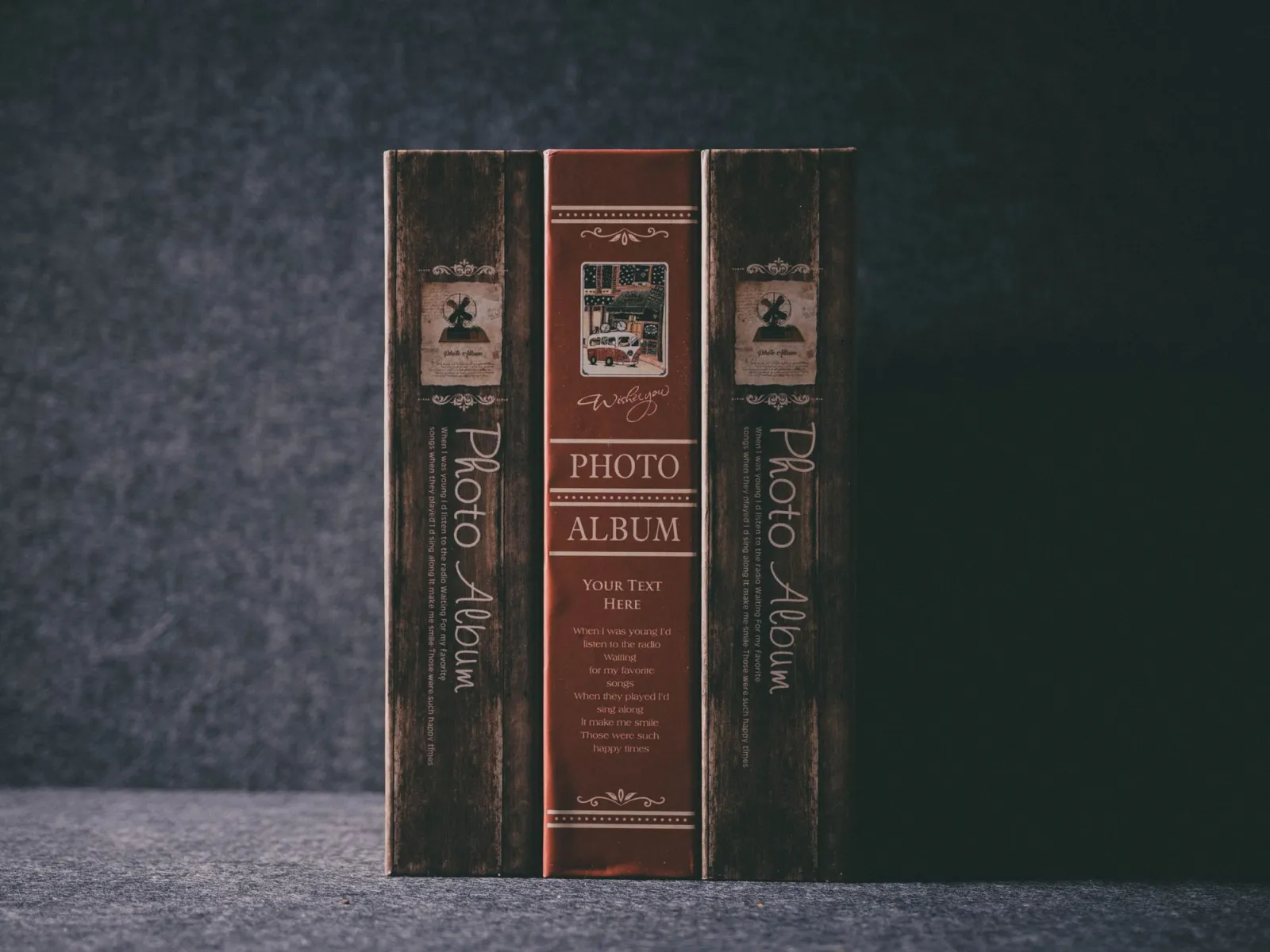 Stack of vintage photo albums waiting for AI restoration and colorization