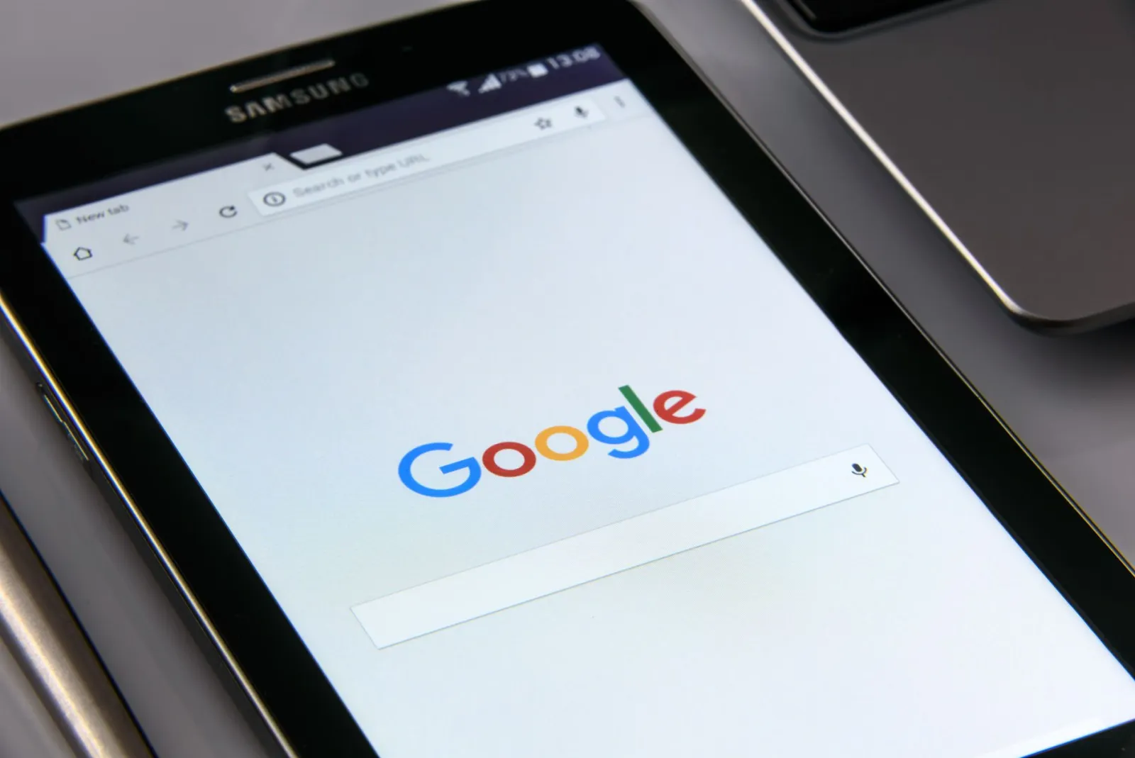 Google search open on a tablet, the surface that now powers AI Overviews