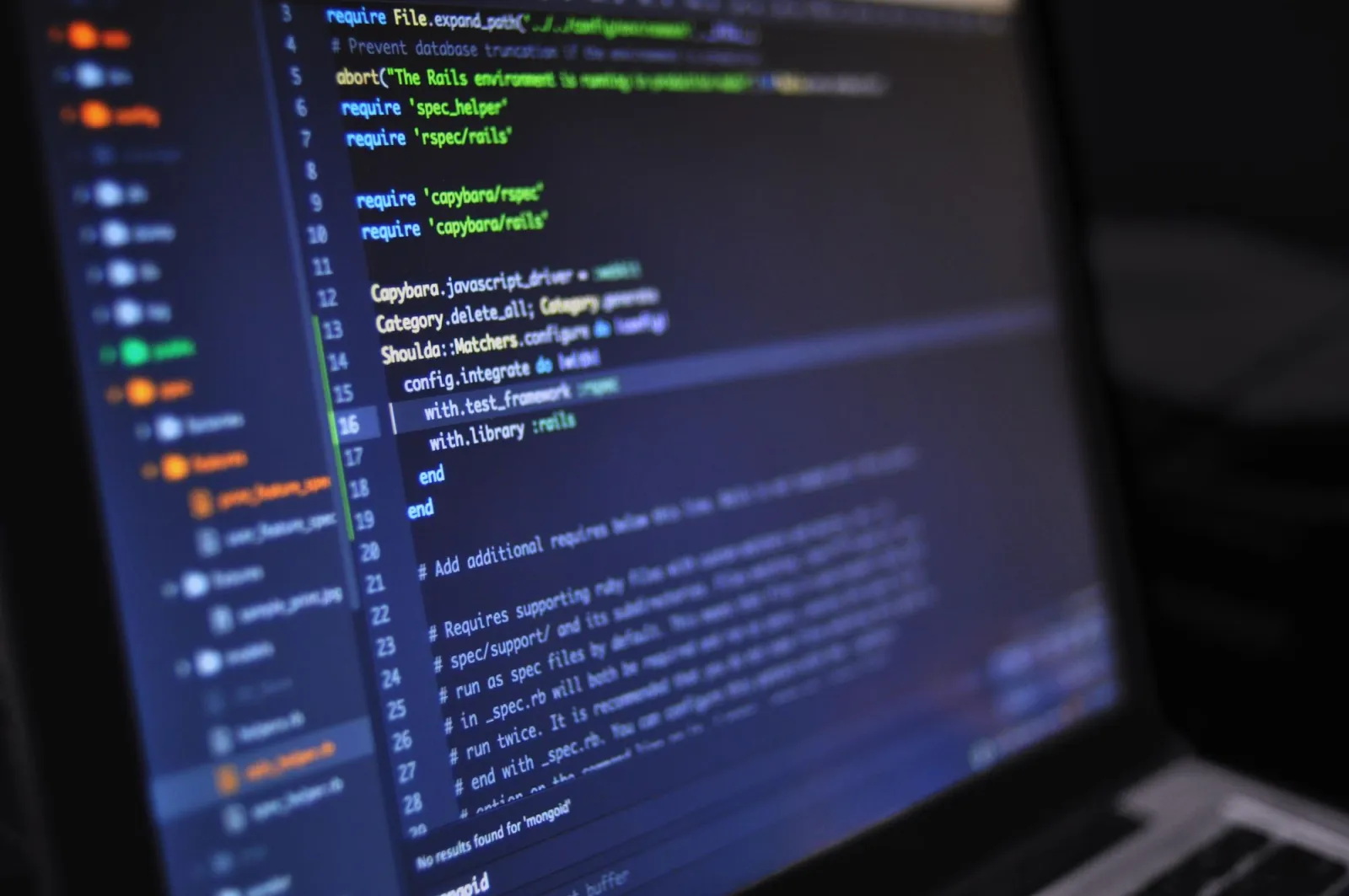 Close-up of programming code on a monitor during development