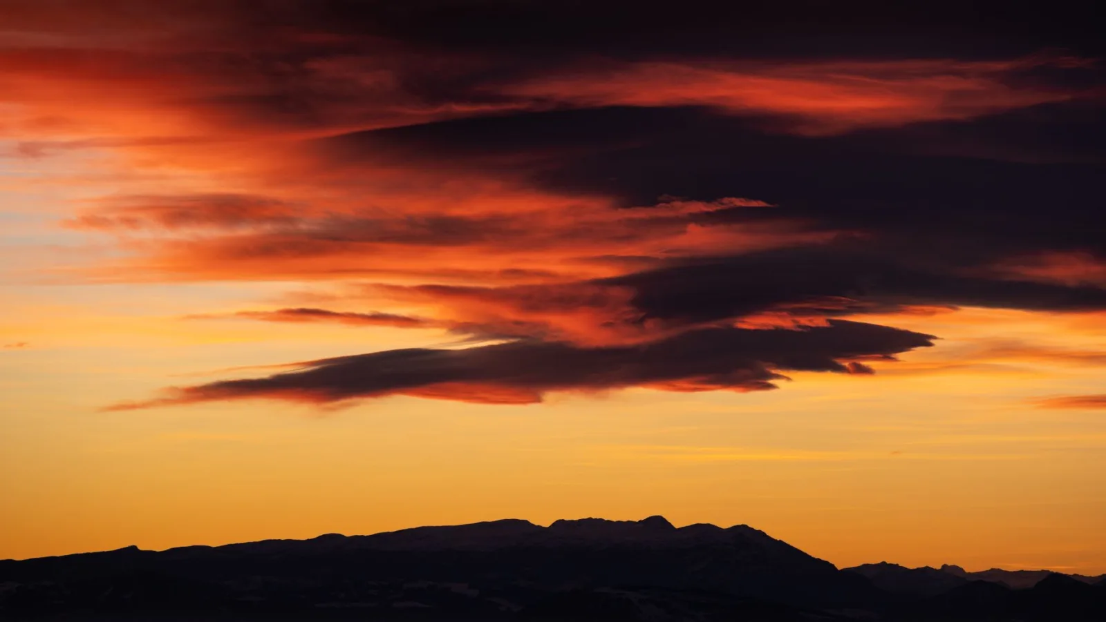 Vibrant clouds at sunset showing the color saturation that tone mapping can easily push too far