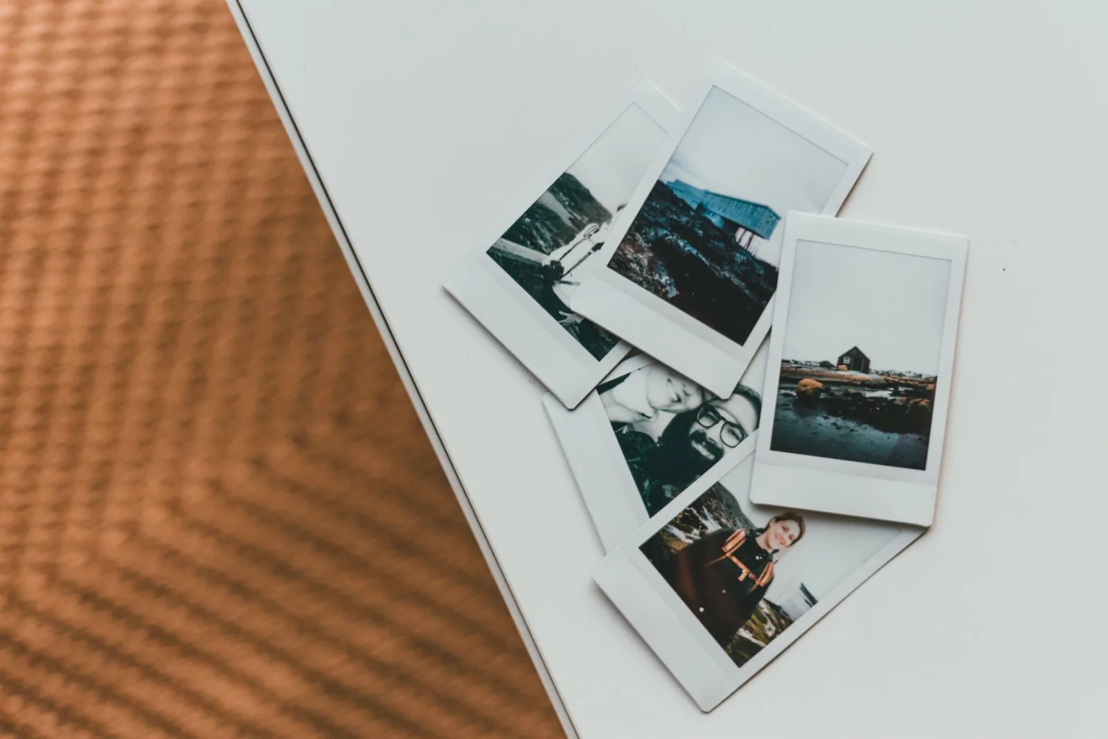 Polaroid-style photos arranged on a surface, a popular casual border style