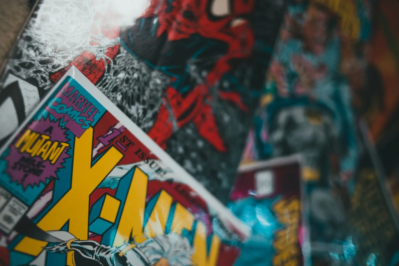 Close-up comic book cover with bold yellow lettering and shallow depth of field