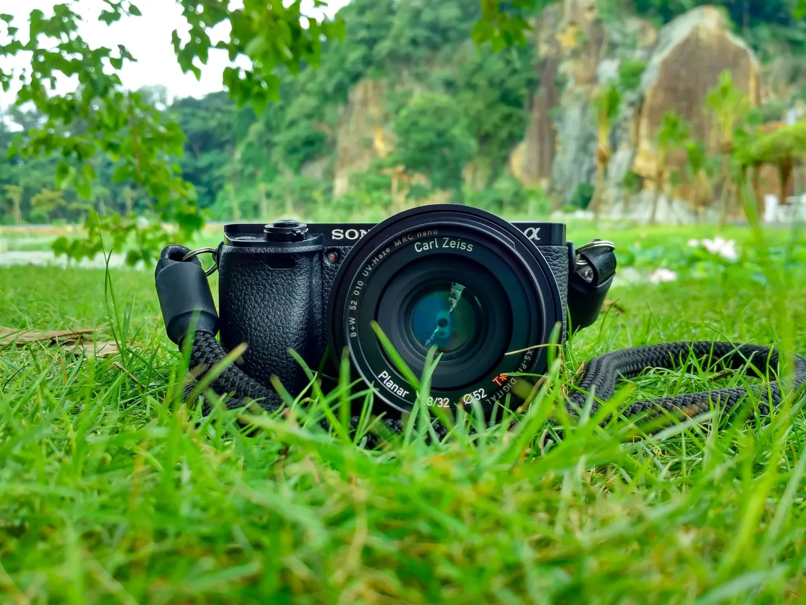 Close-up of a DSLR camera with lens, representing the original high-resolution photos an image size reducer must shrink