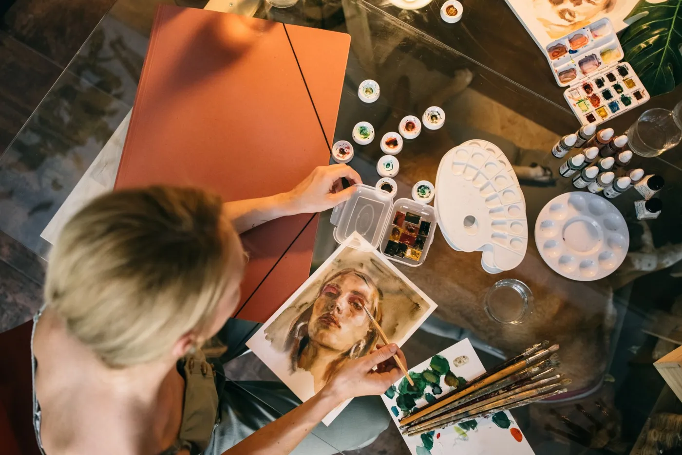 A portrait being painted in watercolor, useful for judging which facial details must stay sharp