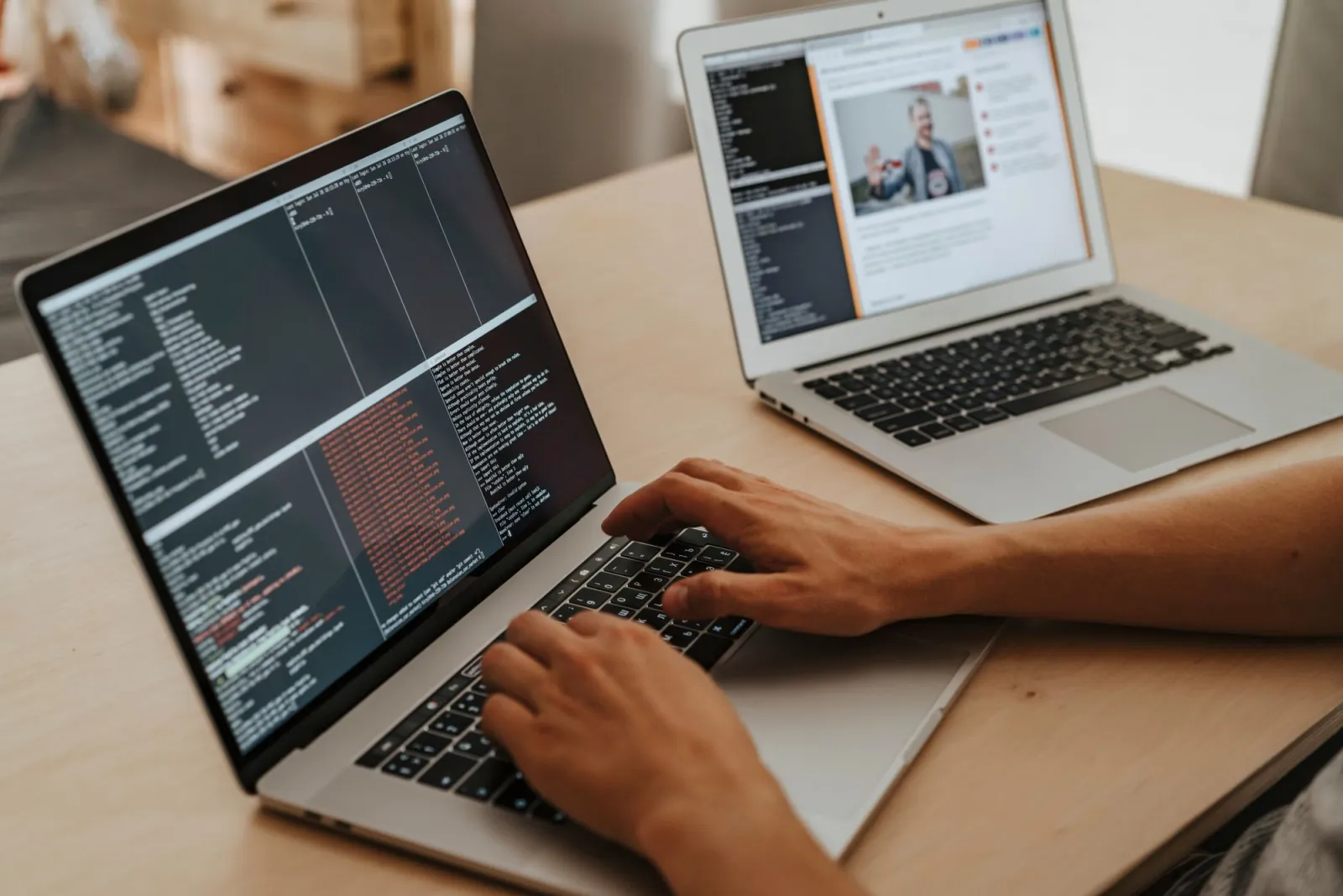 A developer typing on a laptop while configuring a local MCP server in a terminal